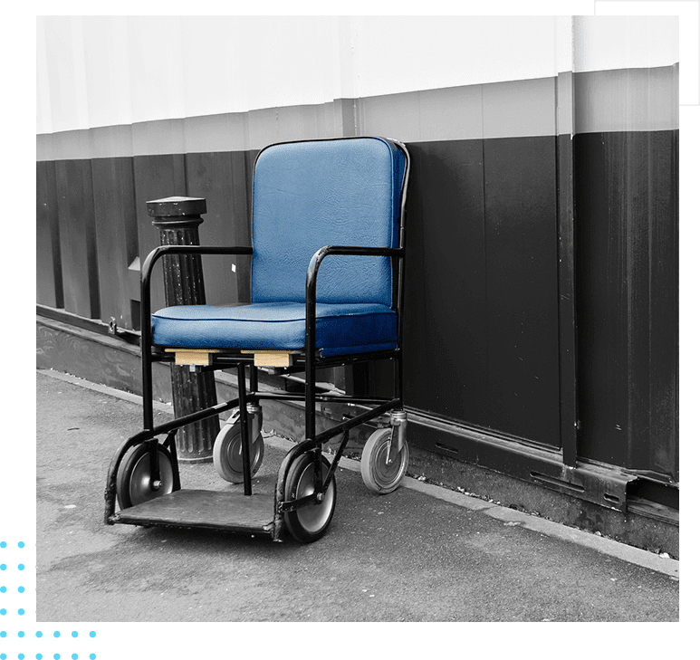 A blue chair sitting on top of a wheel.